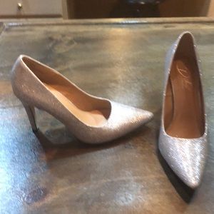 Silver high heel shoes